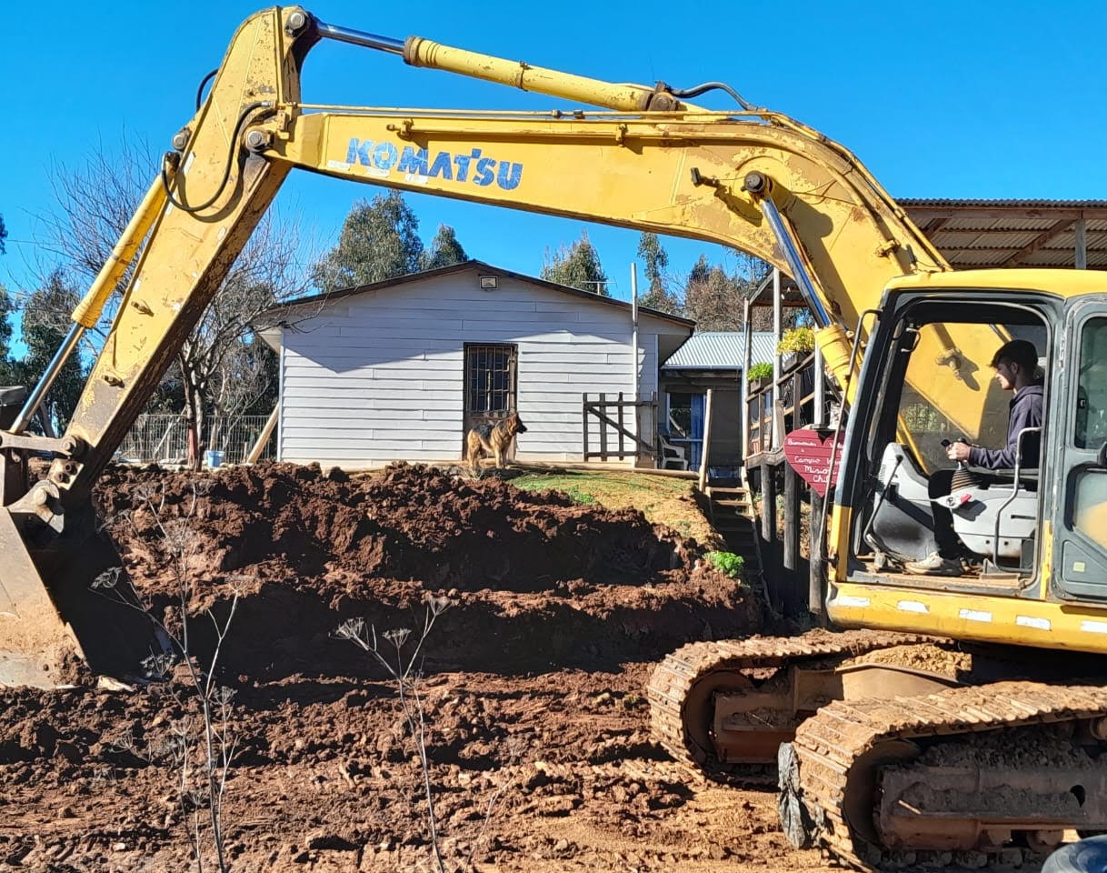 Edge operating the excavator